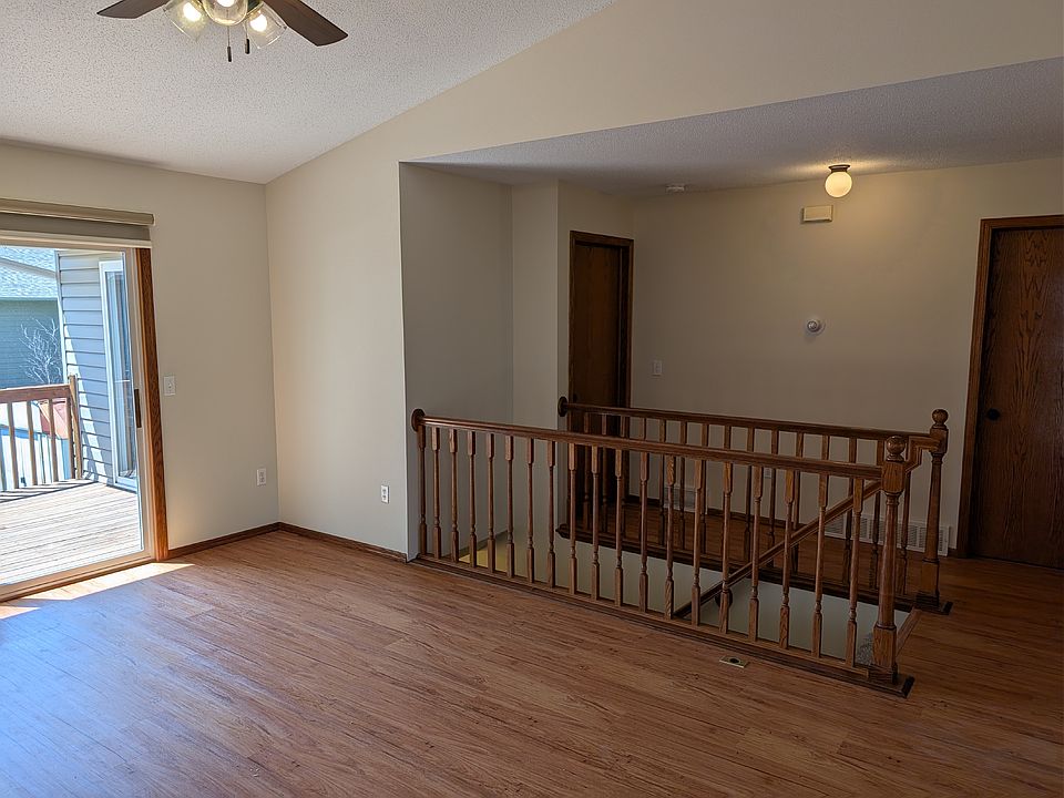 Main living room with deck entrance.