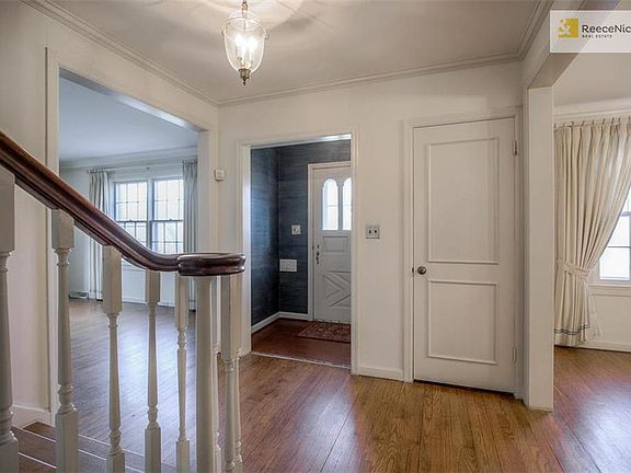 Light, bright entry.  All furnished items are virtual staging.