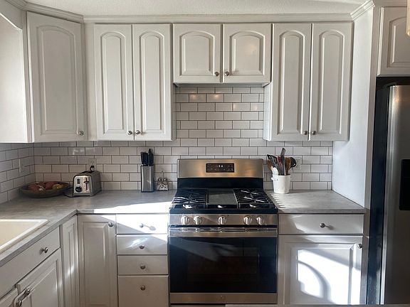 Stainless steel gas stove.