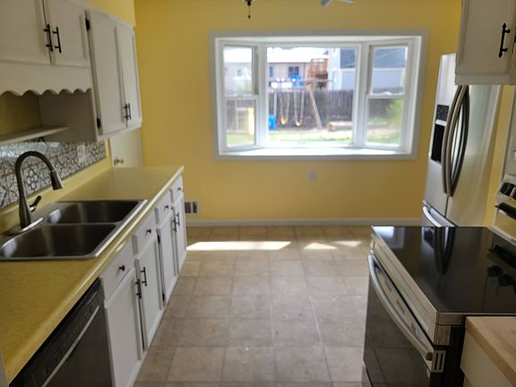 Kitchen - new kitchen stove and butcher block counter