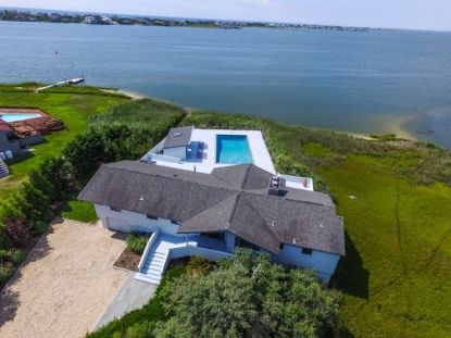  Spectacular bayfront spot Views and Moriches Bay access from your own private sandy beach