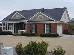 Stately elevation with equally grand interior space!