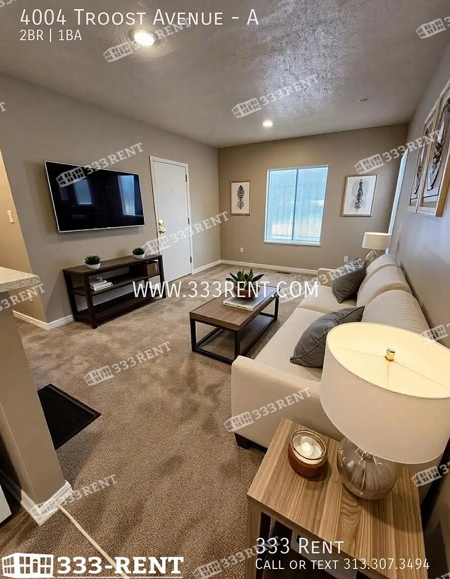 Large converted duplex close to UMKC & Rockhurst with old-world charm and stunning extras through... — Photo 2