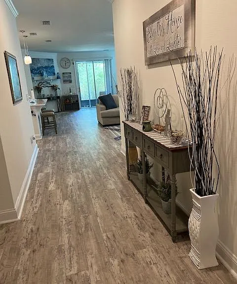 Welcoming entry inviting all who enter to relax and enjoy your warm beachy and farmhouse themed home.