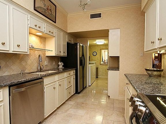 Updated plumbing and light fixtures. Laundry room is located at the back of the kitchen