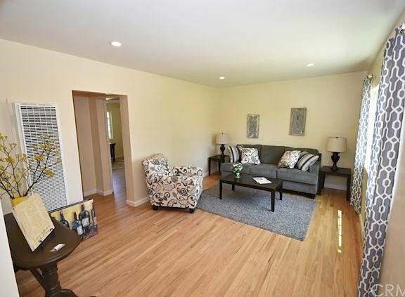 Look at these original gorgeous wood floors. New LED Lighting. New windows.