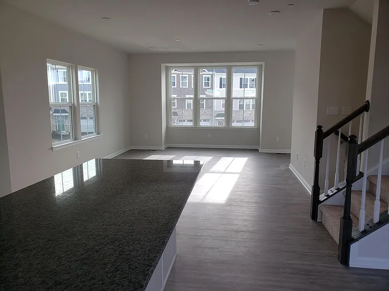 open floor plan from kitchen to living room