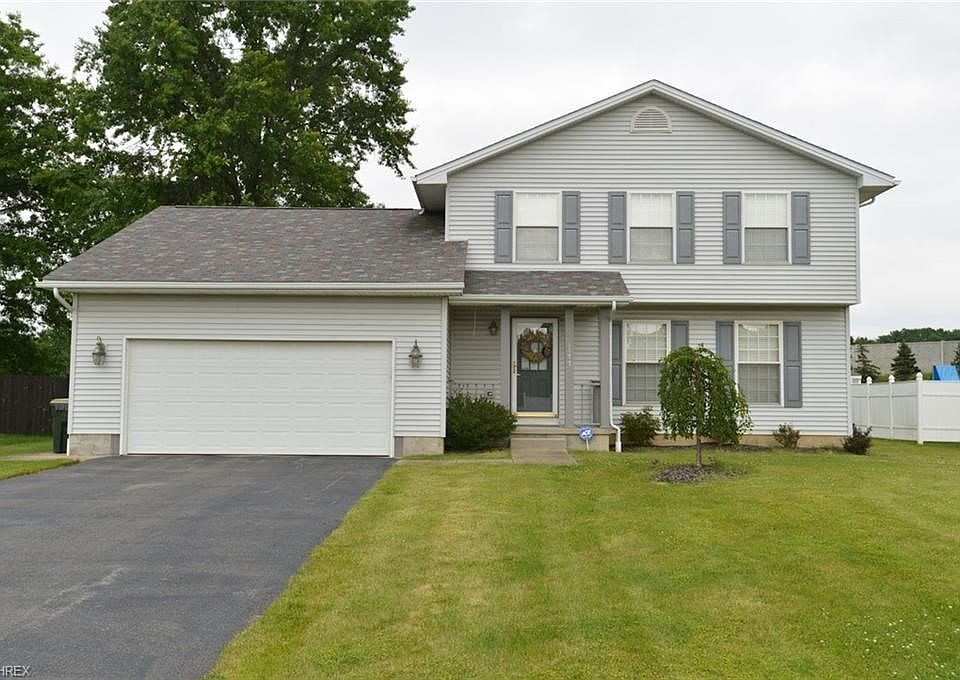 Picture Perfect. Welcoming foyer. Manicured lot with great Landscape lines. Note 2+ attached car garage!