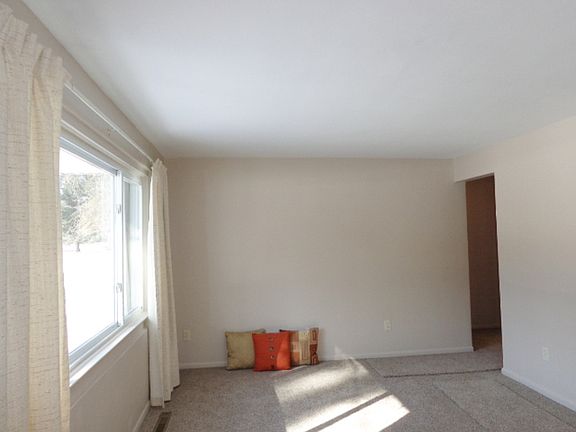 Living room with a large picture window.
