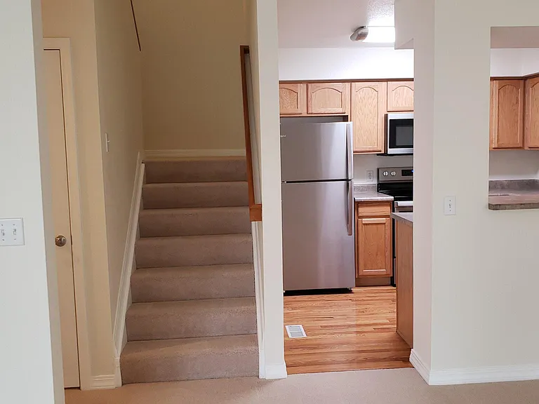 Main Floor - to upstairs and kitchen