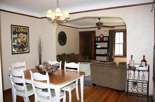 Formal dining and living rooms with hardwood floors