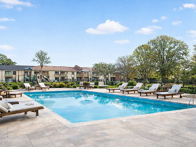 Tranquil poolside in a scenic community