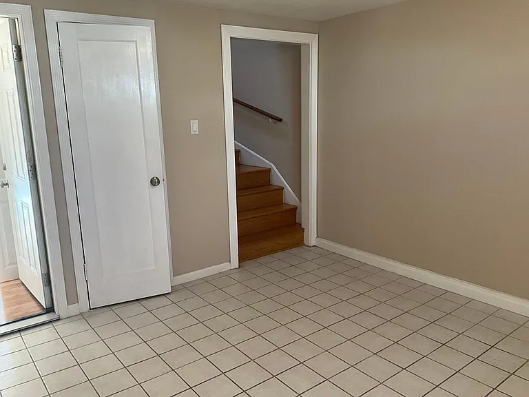 Foyer to upstairs and Downstairs bedroom