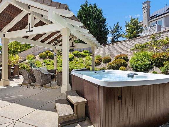Backyard patio with hot tub