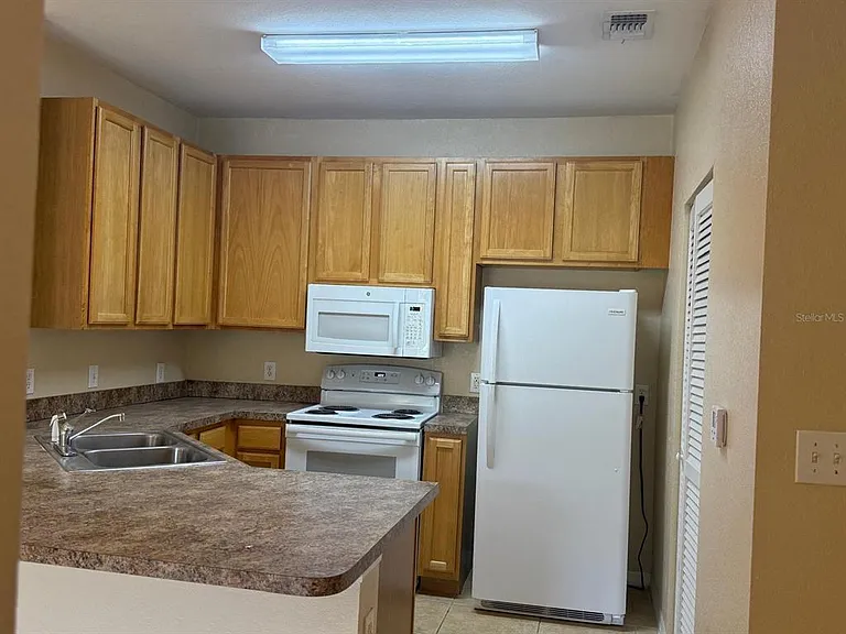 10025 Courtney Palms Blvd #103 — Photo 13