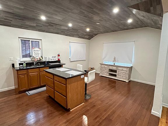 Open kitchen and dining room. View from hallway