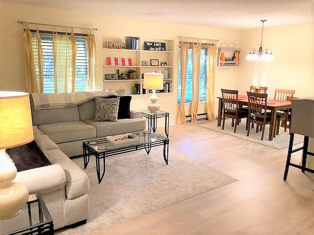Large open living room, dining room and kitchen.