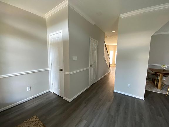 Living view with half bath and and closet