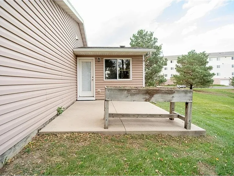 Private Exterior Patio with Separate Entry and Raised Garden