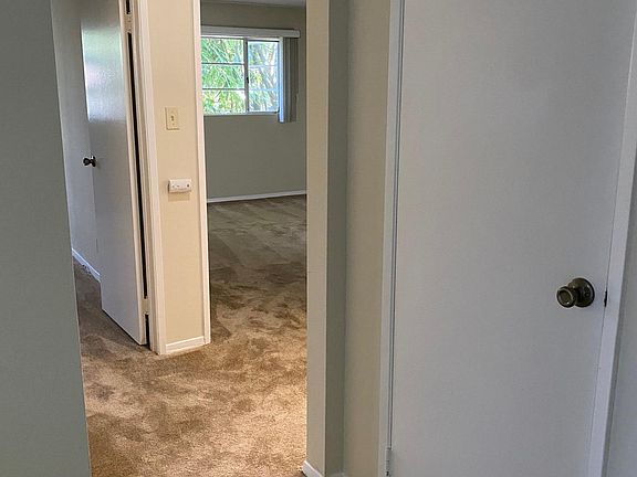 Entry Closet and Entrance to Bedrooms and Baths