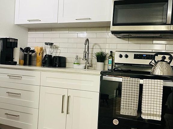 4th image of 8714 N Highland Ave