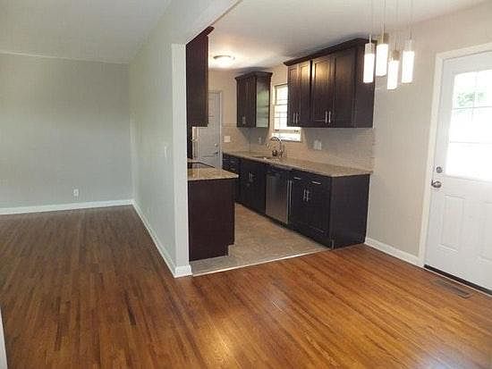 Kitchen off living room with dining space