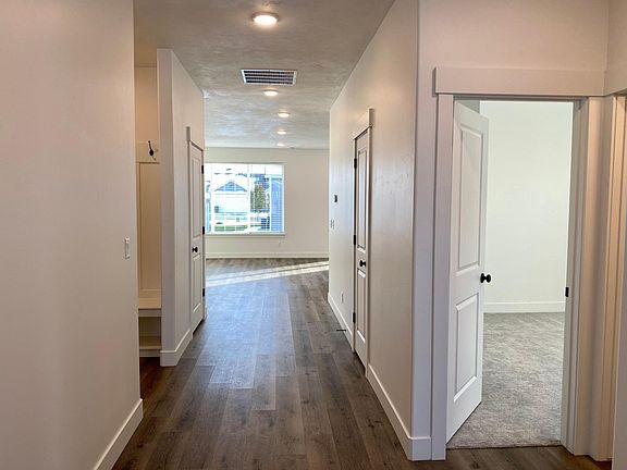 Hallway with 2 storage closets