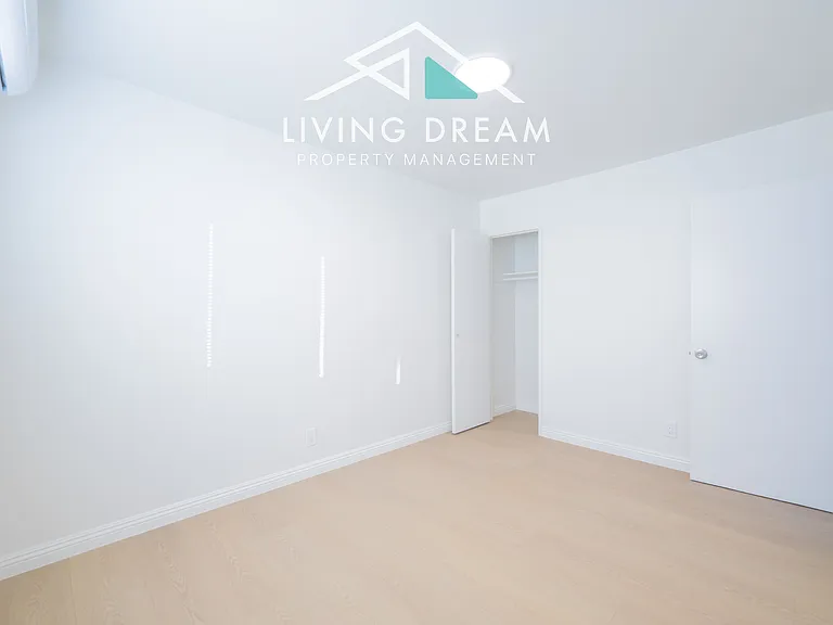 Bedroom 2:
Includes one closet and an air conditioning unit.