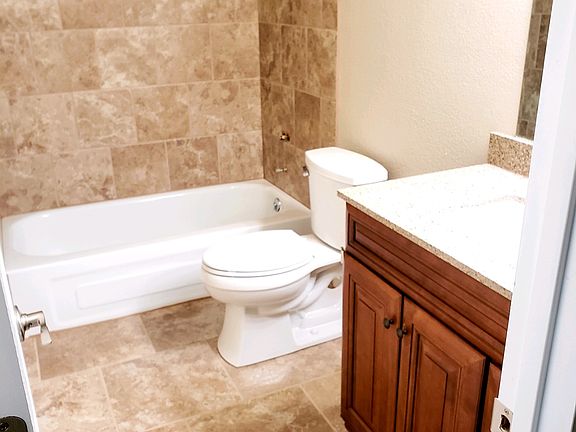 2nd bathroom Remodeled bathroom, new vanity and tile bath and floors
