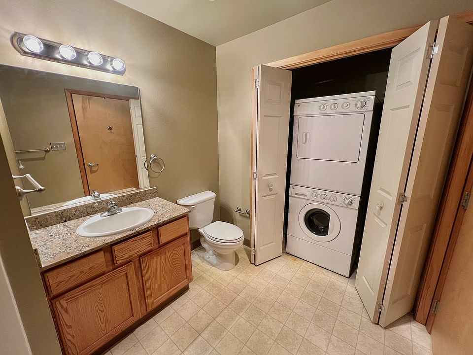 Bathroom with washer and dryer in unit