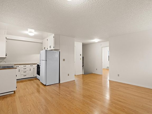 Open floor plan at the top of the stairs; 2 bedrooms are to the right