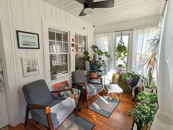 Your window to the neighborhood begins with this gem of a four-season porch. Watch the world go by while enjoying your favorite beverage. (Note: plants and furniture not part of the rental. For staging purposes only.)