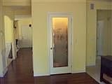 Pantry closet with decrative glass door
