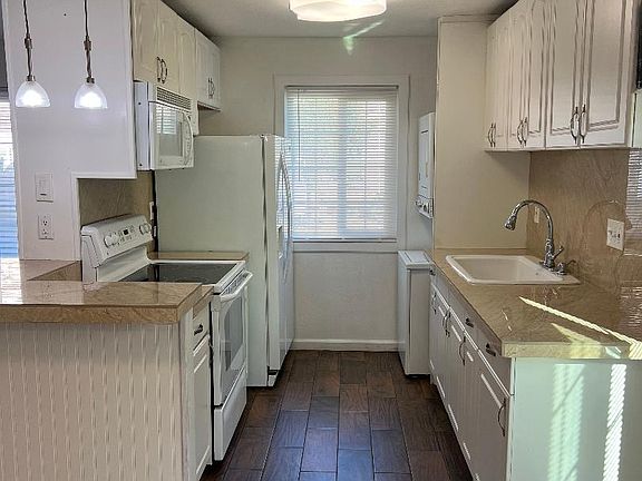 Kitchen area. (washer/dryer far right)