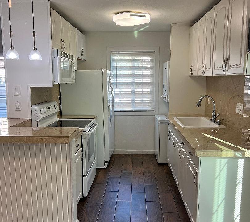 Kitchen area. (washer/dryer far right)