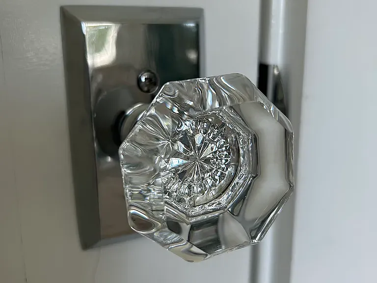 Glass/chrome doorknobs throughout home.