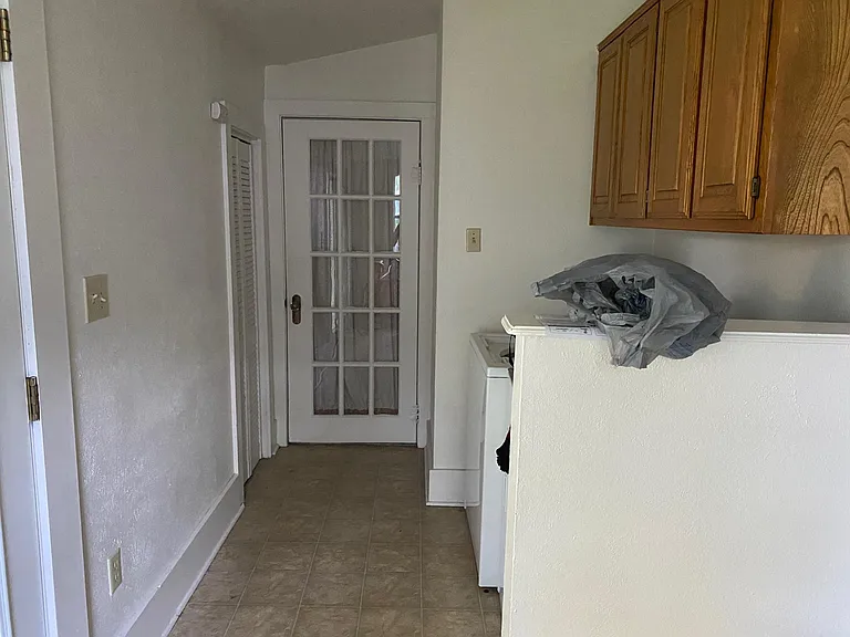 Utility Area - cabinets, washer and dryer