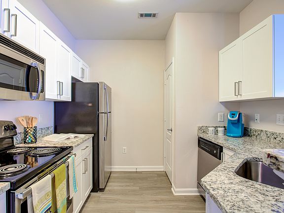 Granite countertops. Upgraded stainless steel appliances in select homes.