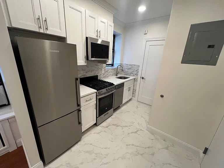 348 E 65th St #17 — Photo 19