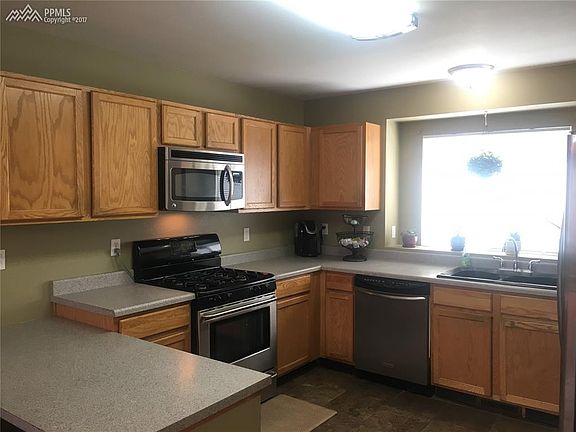 Great kitchen with stainless appliances (all included) and ceramic tile floor.