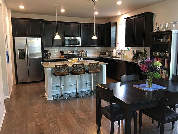 Beautiful kitchen with stainless appliances and a large pant