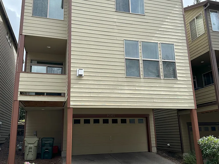 The garage is one level below the living room.