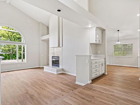 Vaulted high ceilings and oversized window