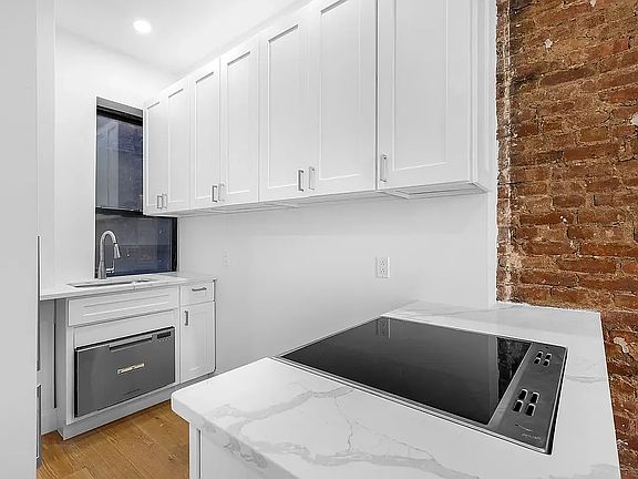 5th image of 337 E 13th St APT 9