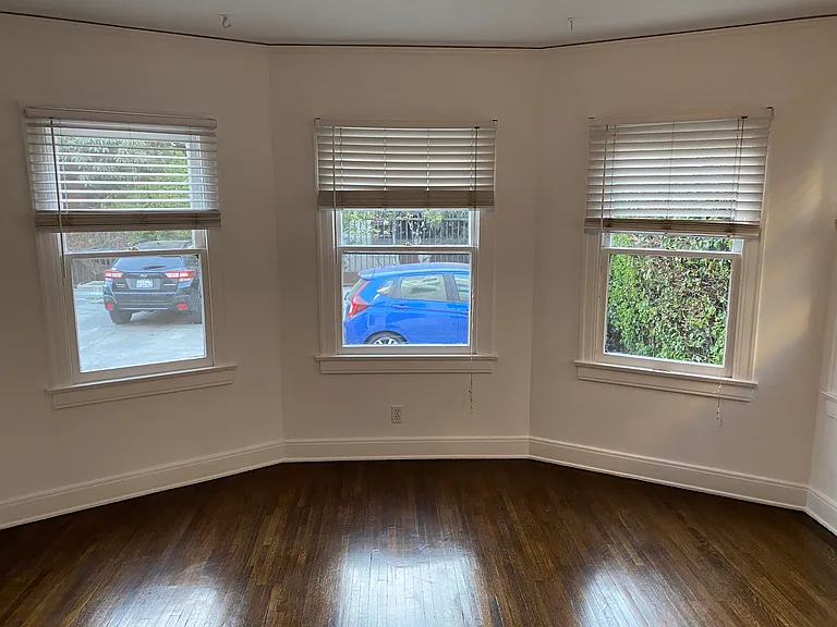 Master Bedroom 2 - With Octagonal Wall of Original Double Hung Windows