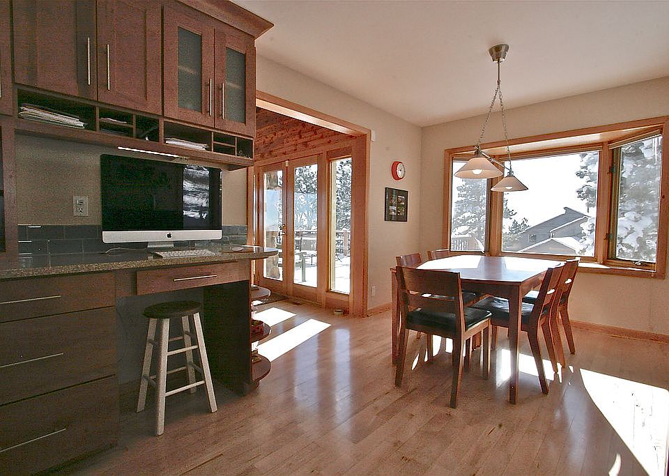 Desk area and eat-in kitchen