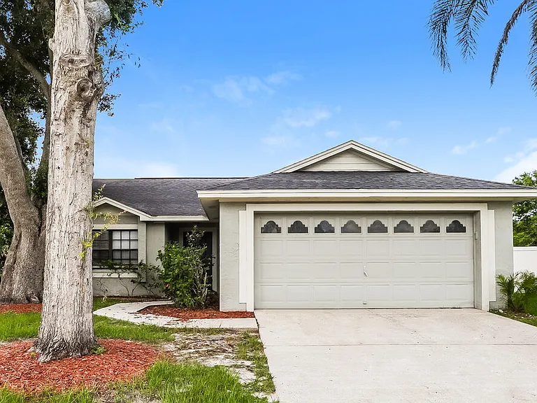 10818 Peppersong Dr — Photo 1