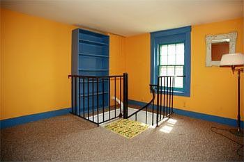Some built-in features include bookcase and dresser