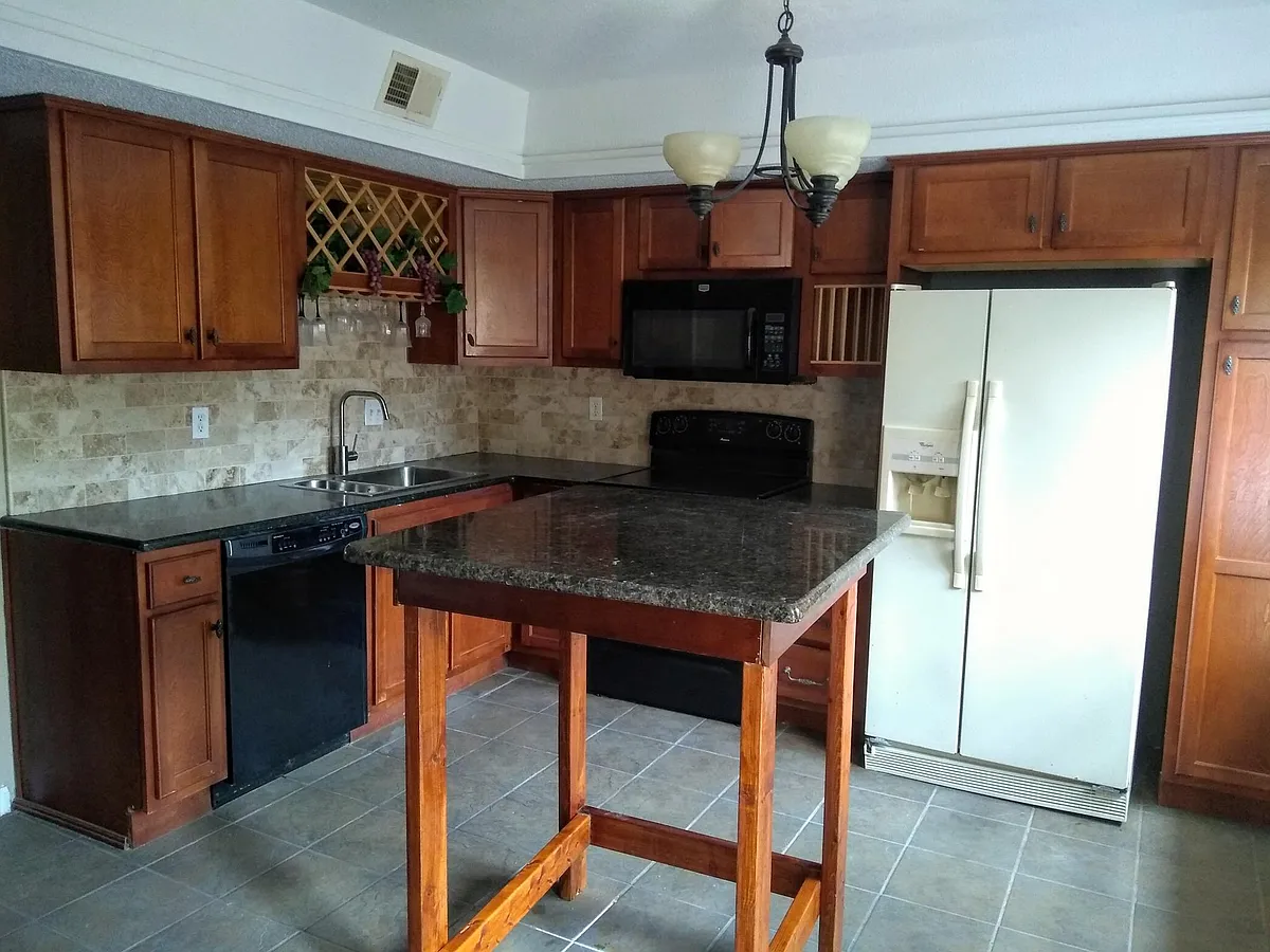 Building Photo - 6621 Poplar Woods Cir S