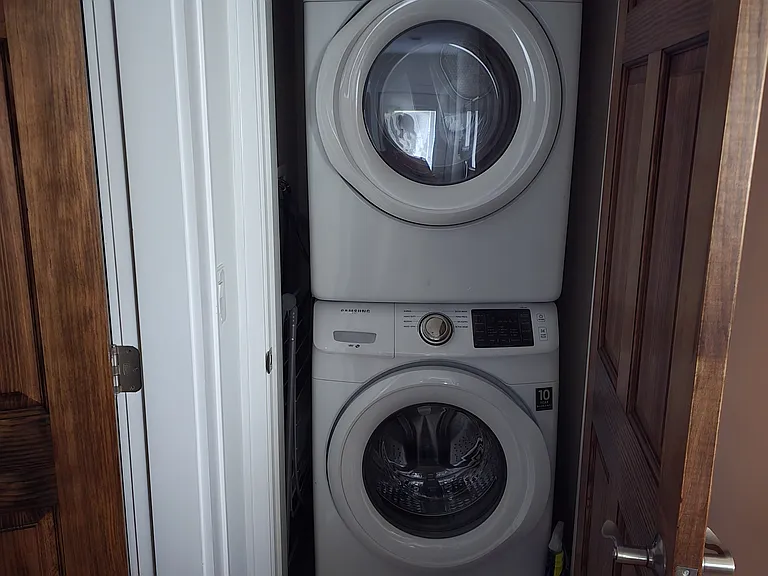 LG. CAPACITY STACKABLE WASHER AND DRYER CLOSET